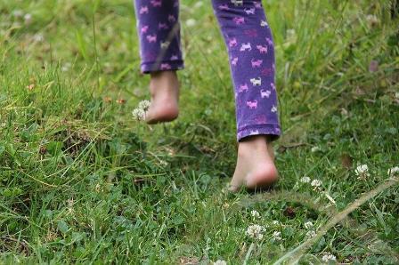 walking barefoot on Earth